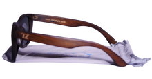 Load image into Gallery viewer, Sunsetterz | Red Lens | Floating Bamboo Sunglasses | Polarized | TZ LIFESTYLE